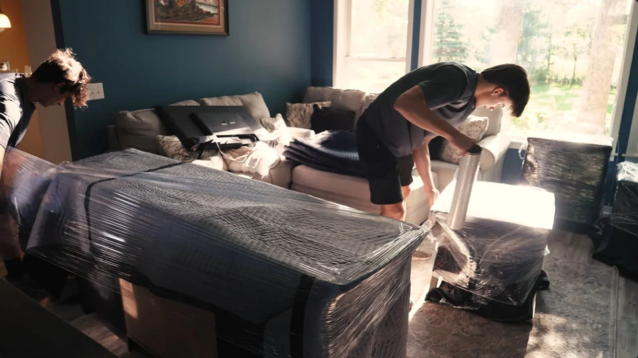 Movers completing a careful unloading sequence