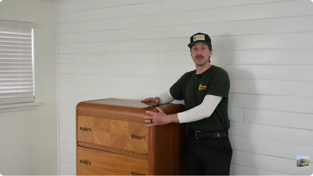 Movers completing a careful unloading sequence